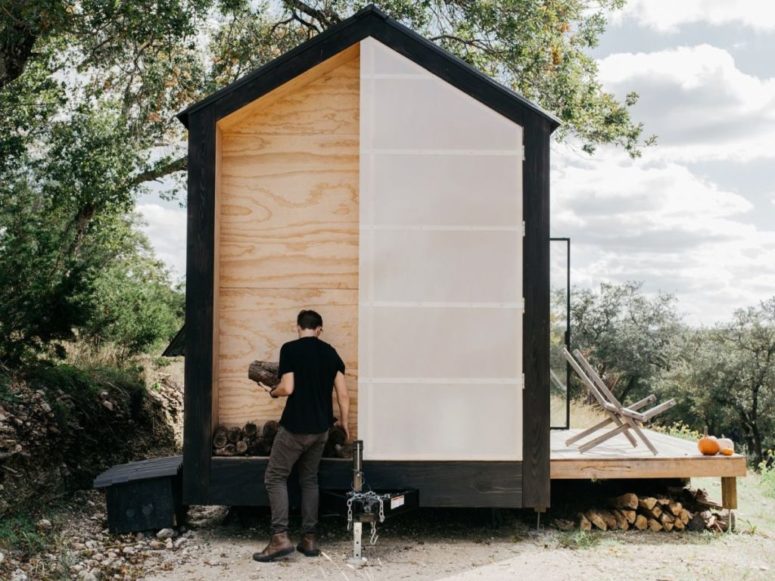 a tiny cabinet with a storage space One side of the cabin features a fiberglass panel designed to conceal service and storage area