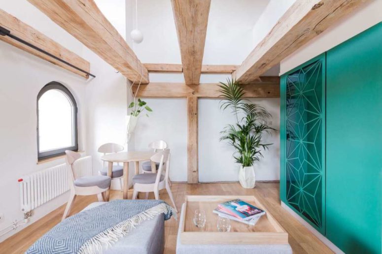 The dining zone is located by the window, it's a part of the living room, and the colorful block on the right is a bathroom The dining zone is located by the window, it's a part of the living room, and the colorful block on the right is a bathroom