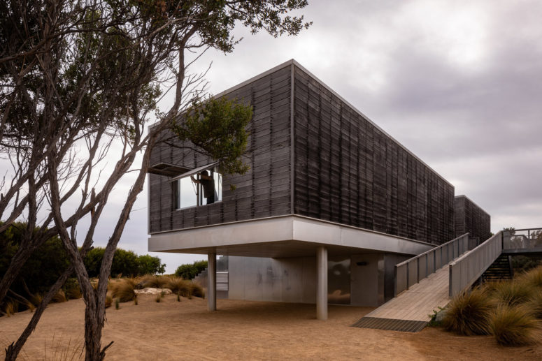 The villa is raised above the ground and is clad with weathered wood and reclaimed wood that were taken from the previous building here The villa is raised above the ground and is clad with weathered wood and reclaimed wood that were taken from the previous building here