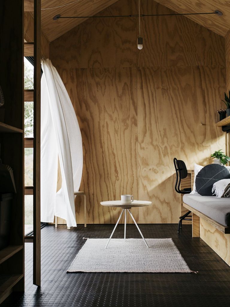 Inside the cabin is done with light colroed plywood, a matching ceiling and rubber floor tiles in black Inside the cabin is done with light-colroed plywood, a matching ceiling and rubber floor tiles in black