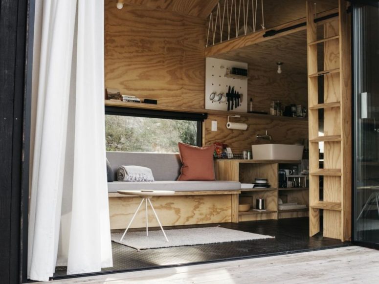 The furniture is minimalist and built in, it's very functional, and the cabin itself is very small to inspire to spend more time outdoors The furniture is minimalist and built-in, it's very functional, and the cabin itself is very small to inspire to spend more time outdoors