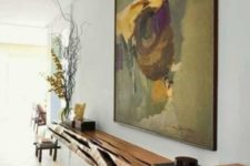 06 a floating console made of a single wooden slab with a live edge is a great statement in your interior