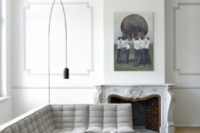 06 an all-white living room with a light grey sofa and some touches of black for a bit of drama