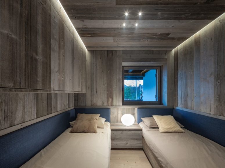 a practical bedroom that is small yet cool Although small, this double bedroom has a super cozy look which is emphasized by a small, square window