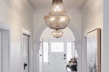 12 a couple of gorgeous and stylish chandeliers will add chic and charm to your entryway