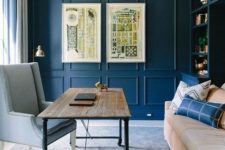 17 bright blue paneled walls and built-in shelves make up a chic look and neutral furniture refreshes the room