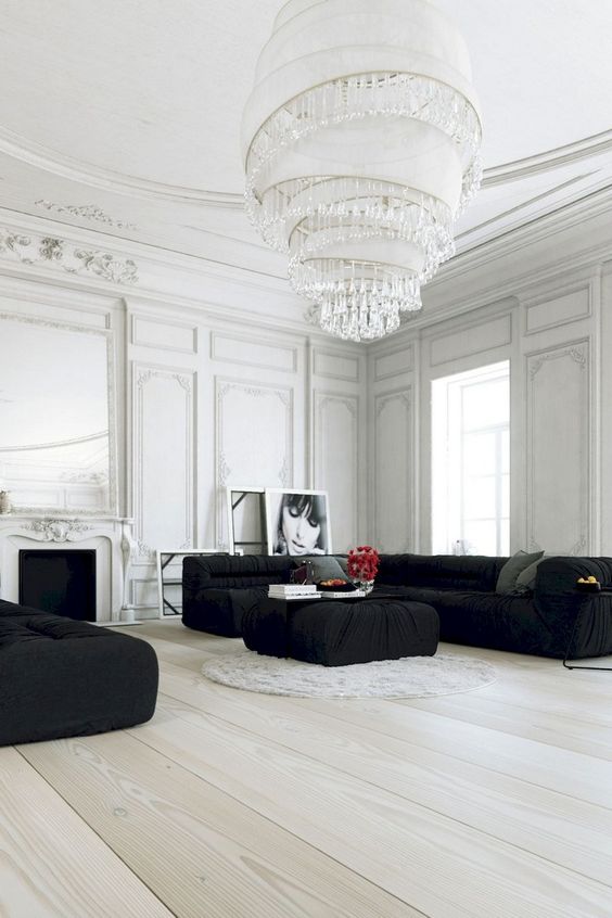a gorgeous statement chandelier with crystal drops takes over the whole room making it striking