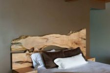18 a live edge headboard makes a statement and sleek wall-mounted nightstands seem to continue the piece