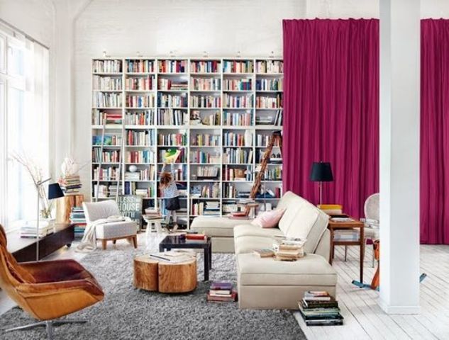 bright pink curtains add color to the space and make it catchier and bolder