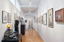 23 here track lighting brings much light to the space and helps to see each wall art
