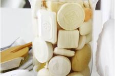 24 a stylish glass jar with various soaps will instantly raise the level of chic in your bathroom