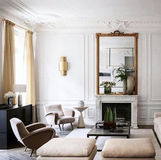 highlight the ornate fireplace with a fantastic statement mirror like this one, and your room will get more refined