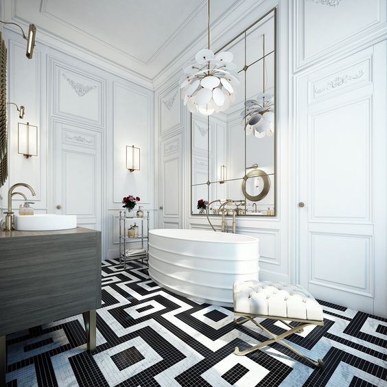 a super chic and elegant monochromatic bathroom with a patterned floor, a statement chandelier, a large mirror, a sculptural tub and gilded touches a super chic and elegant monochromatic bathroom with a patterned floor, a statement chandelier, a large mirror, a sculptural tub and gilded touches