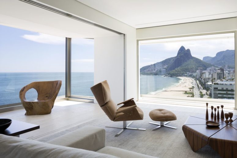 This gorgeous apartment is done with 360 degrees views of Ipanema Beach and everything here is centered around the views