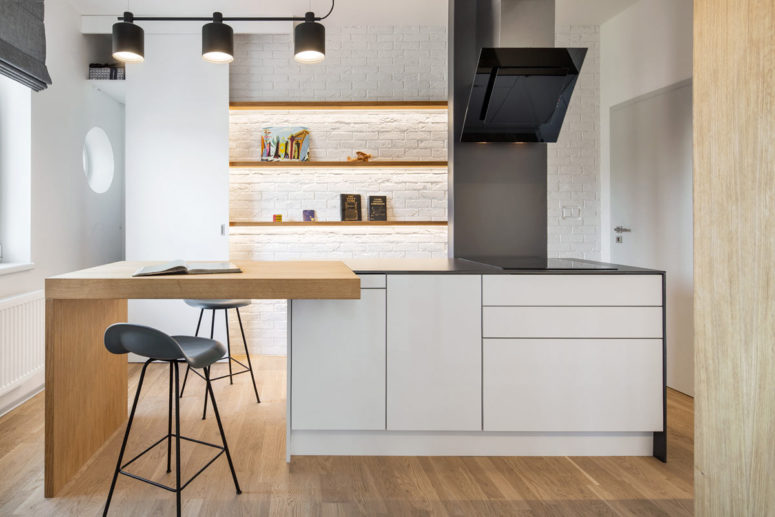 This minimalist apartment is done for a young and busy man who wants to use it sometimes as a city pad This minimalist apartment is done for a young and busy man who wants to use it sometimes as a city pad