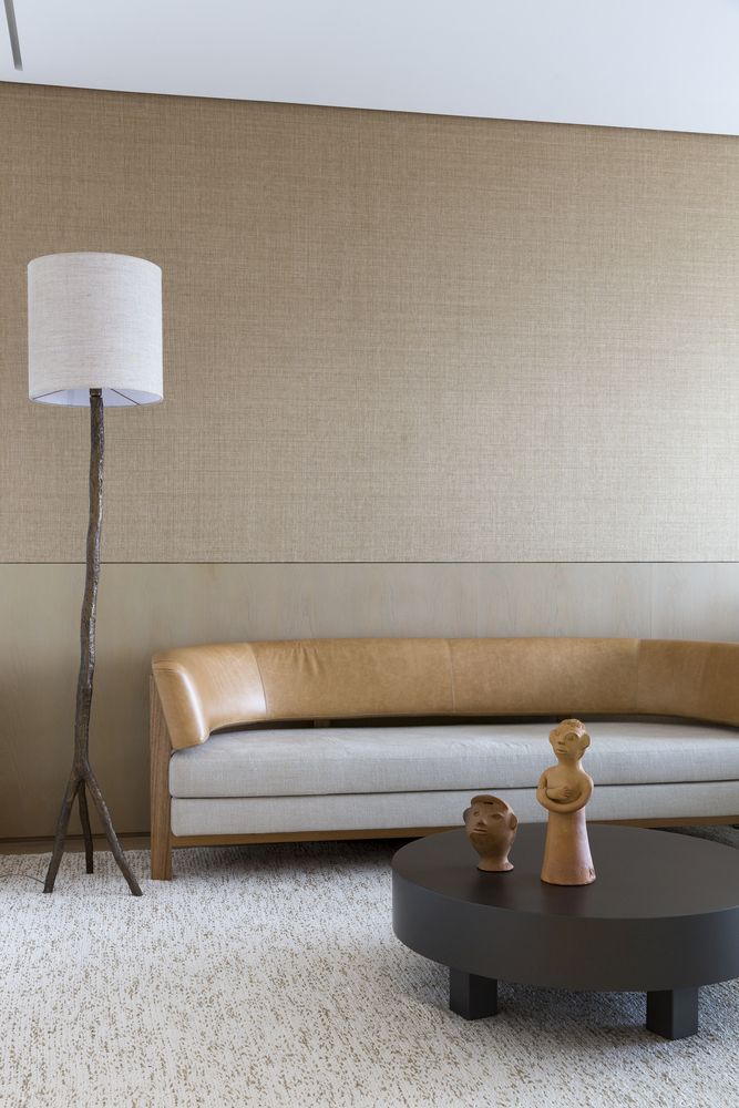 a branch lamp is a touch of nature for a contemporary interior The furniture is contemporary and very elegant, with much texture and unique details like a branch lamp base