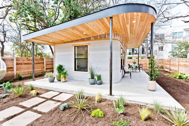 The house is built of cement and plywood, the base is 3D printed and all the rest is installed manually The house is built of cement and plywood, the base is 3D printed and all the rest is installed manually