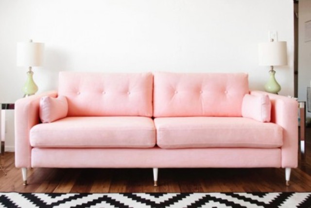 a chic mid-century modern hack of an IKEA Karlstad sofa in pink will brighten up your space