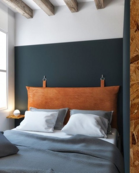 leather in such a rich color is a very edgy option, it will add color and texture to the bedroom at once
