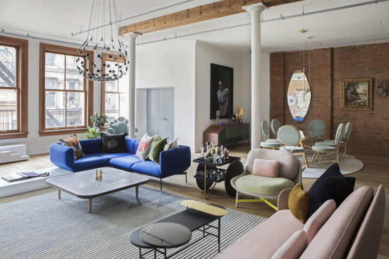 pendant lamps could always make a statement The color scheme is pretty bright, there's a statement pendant lamp and lots of light coming in
