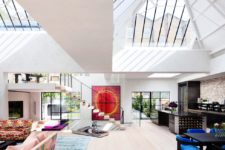 03 The main layout is an open space with a living room, a lounge, a dining room and a kitchen and there are lots of colorful touches