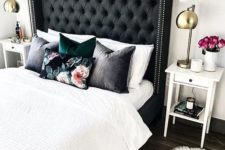 03 a black tall diamond upholstery headboard with nail trim is a bold and chic statement with a touch of drama