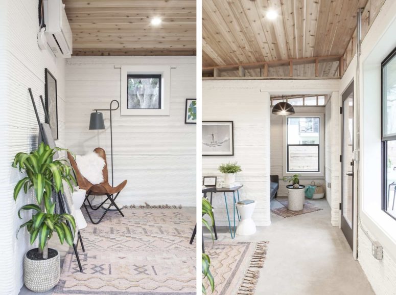 The decor is mid century modern, with boho touches and lots of potted greenery to make the home cozier The decor is mid-century modern, with boho touches and lots of potted greenery to make the home cozier