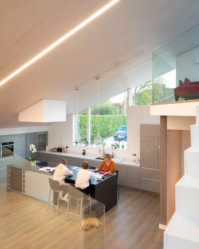 The kitchen is glazed, with built in lights and sleek cabinets, the surfaces are rather sleek and chic The kitchen is glazed, with built-in lights and sleek cabinets, the surfaces are rather sleek and chic