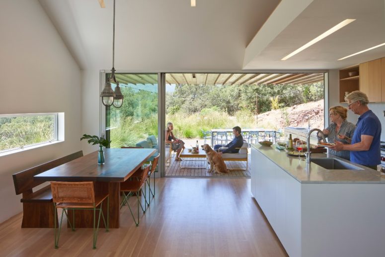 The kitchen is the heart of the house, and there's a dining space here, with is located next to a window The kitchen is the heart of the house, and there's a dining space here, with is located next to a window