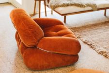 04 a chic rust-colored velvet chair is a stylish addiotion to a neutral and muted boho living room