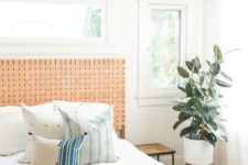 04 a muted orange woven leather headboard is a stylish accent for this boho bedroom that adds a warm feel to it