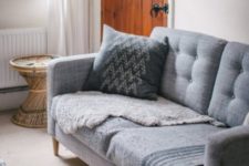 04 an IKEA Karlstad hack with tufting and mid-century legs is a chic and timeless idea to go for