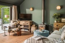 a stylish industrial living room with hanging lights