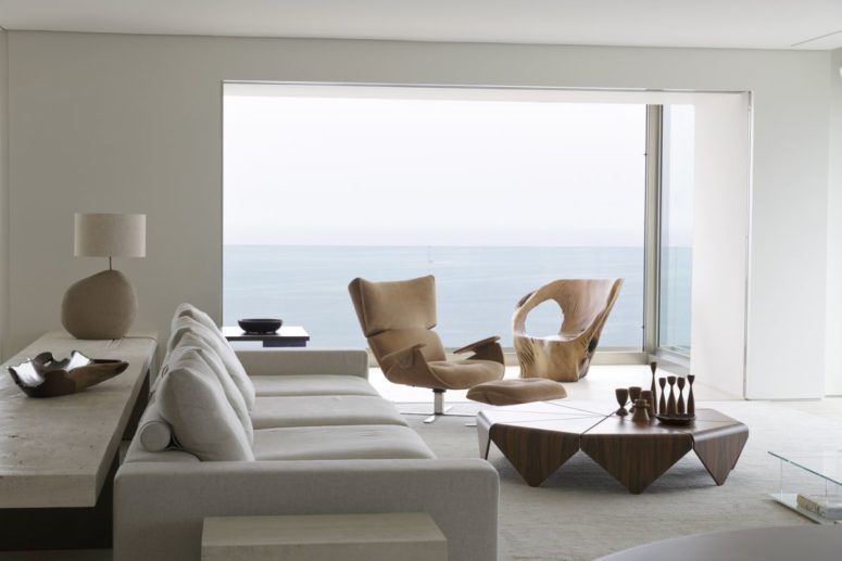 Everyone here can enjoy the views from each point of the apartment, and chic materials add a luxurious touch to the interiors Everyone here can enjoy the views from each point of the apartment, and chic materials add a luxurious touch to the interiors
