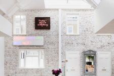 05 The history of this space is kept safe and a new story is added here with bright and bold contemporary furniture and art