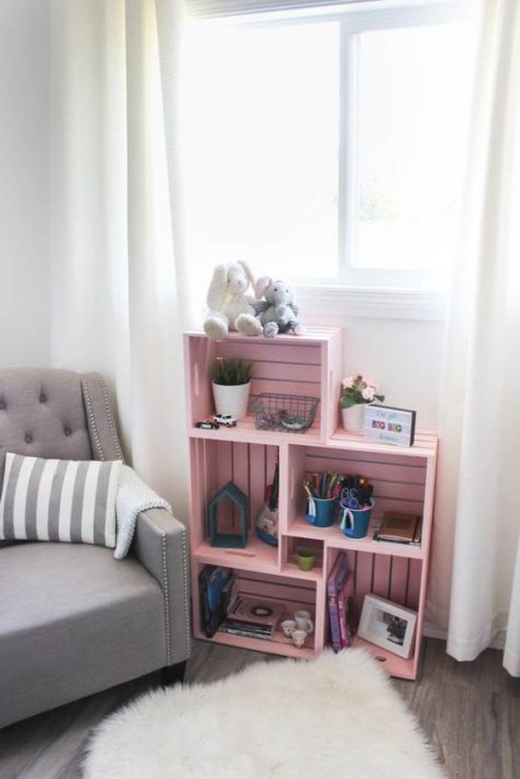a pink crate shelving unit is an easy idea to add storage space and a soft touch of color