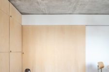 06 The plywood panels feature some holes for the cat to move comfortably wherever it wants