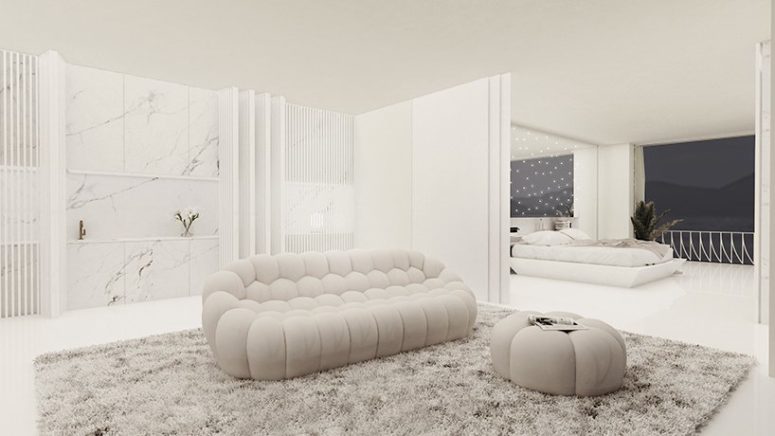 There's a lounge here, a sleek white marble kitchen and the spaces can be separated with a space divider for privacy There's a lounge here, a sleek white marble kitchen and the spaces can be separated with a space divider for privacy