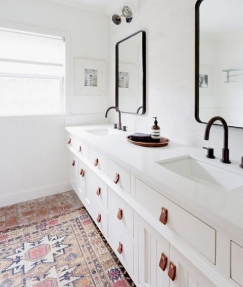 Ikea Hemnes sink cabinets spruced up with leather pulls are a gorgeous idea for a bathroom
