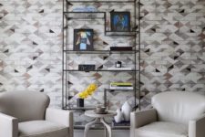 08 The apartment features a lot of personality, geometric touches and chic furniture