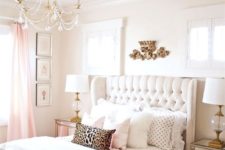 08 a cute and glam girlish bedroom is completed with a creamy wingback headboard, which is tufted for a more chic look