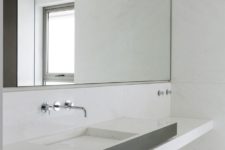 11 Large mirrors reflect the views and give the bathrooms a very bright and airy feel