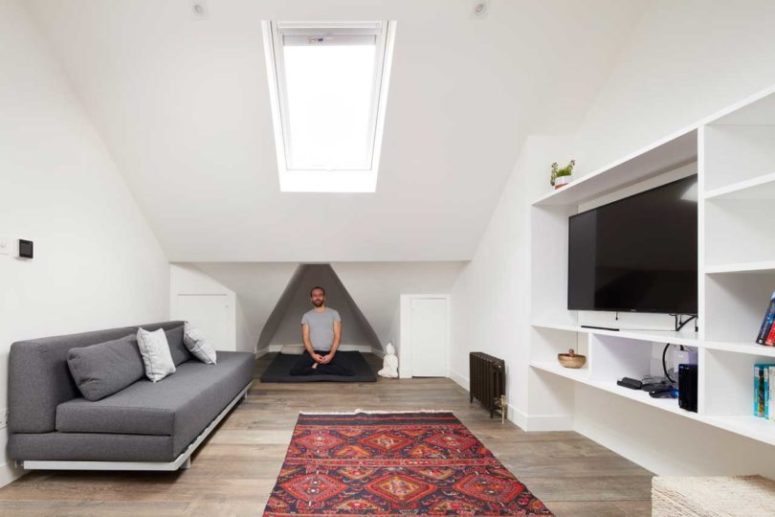 This room is used as a second living room and a yoga room, with a tiny nook right for this