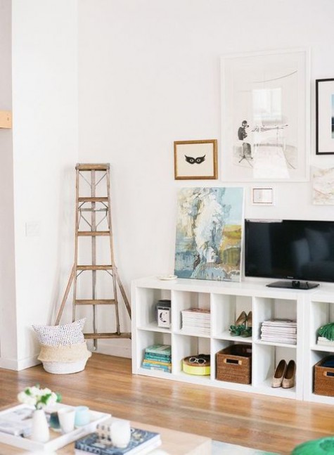 a simple and stylish TV unit made of IKEA Kallax units is a genius idea for a contemporary space