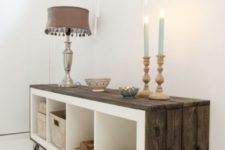 18 an IKEA Expedit shelf covered with weathered wood and put on casters looks super cool