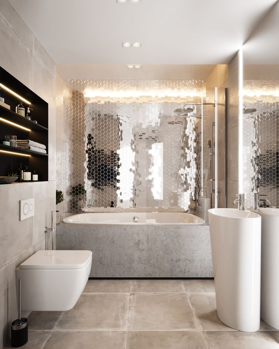 a statement reflective hex tile wall refreshes and nelivens the neutral bathroom done with stone