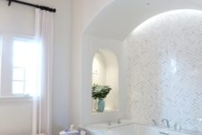 19 lights built in over the tub and in the niches make the bathing space cozier and comfier