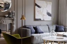 20 a black chandelier with a bold design adds to the mid-century modern style of the room