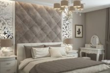 20 a refined taupe velvet headboard with padding comes up to the refined ceiling and adds a chic statement to the space