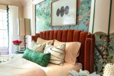 21 a rust-colored padded headboard continues the bright color scheme and completes the space perfectly